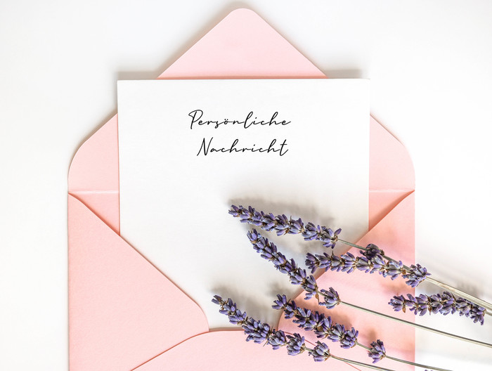 Top view pink envelope with copy space and lavender / Freepik Top view pink envelope with copy space and lavender.