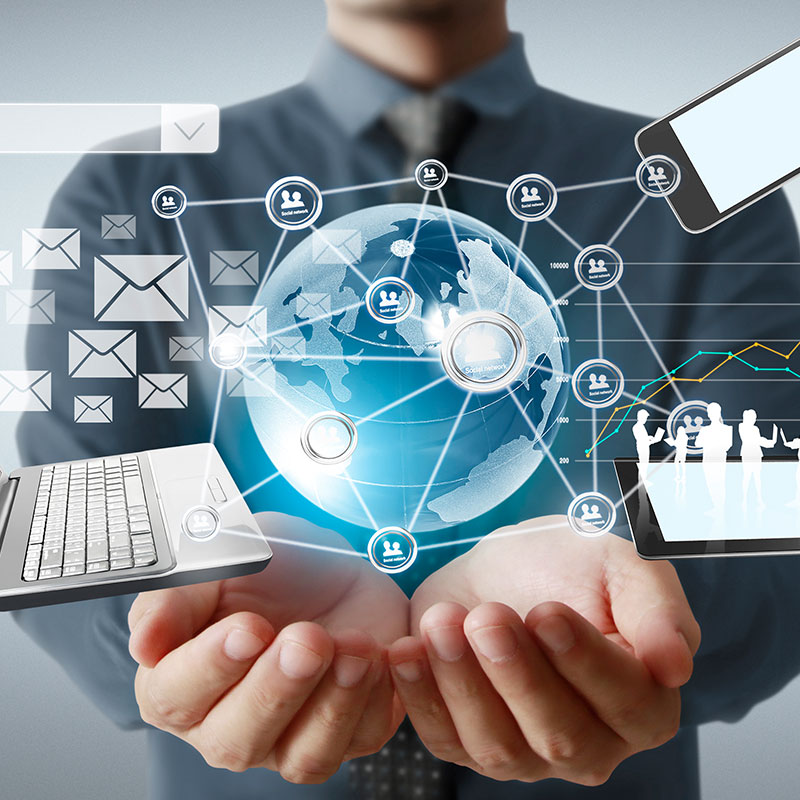 IT-Services 800px / clipdealer Symbolbild IT-Services mit Weltkugel, Laptop, Handy und Datenverbindung